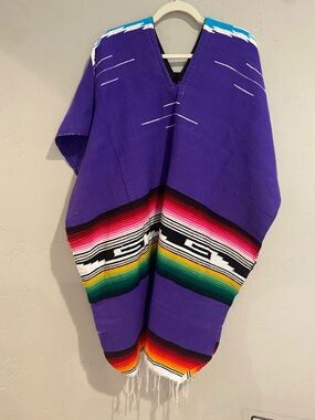 Purple Mexican Serape Poncho with Rainbow Stripes.